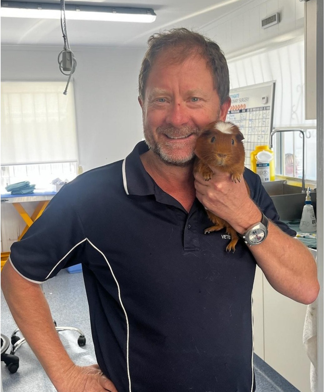 Dr Bernie with a guinea pig